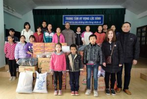 Zamil Steel Buildings Vietnam’s charity team with the children at Hy Vong Orphanage 